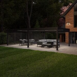 Como 7.8m x 4m Aluminium Metal Outdoor Garden Pergola in dim light setting