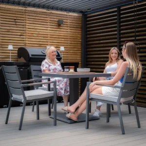 3 Women sitting out in the new garden space